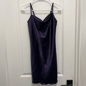 A super cute satin purple dress in perfect condition from bebe